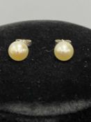 PAIR OF MIKIMOTO PEARL STUD EARRINGS in original box Provenance: private collection Conwy