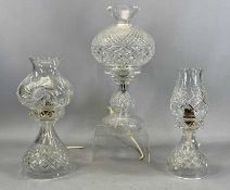 THREE CUT GLASS TABLE LAMPS with conical shades, 36cms (h) the tallest Provenance: private