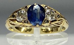 18CT GOLD RING set with central sapphire, flanked by diamonds, size M, 3.9gms Provenance: private