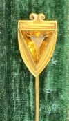 14CT GOLD STICKPIN shield shape and set with orange stone, 3gms, in fitted case Provenance: