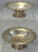 PAIR OF GEORGE V CIRCULAR SILVER BONBON DISHES with 'fish scale' decoration on circular feet, Mappin