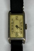 ART DECO LADY'S COCKTAIL WATCH, rectangular case, silvered dial having stylised Arabic numerals,