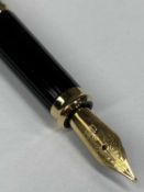 A CROSS STAINLESS STEEL FOUNTAIN PEN having gold plated fittings and nib, uninked, in box with