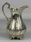 VICTORIAN SILVER JUG, circular wasted form with chased decoration, scrolled handle, London 1854,