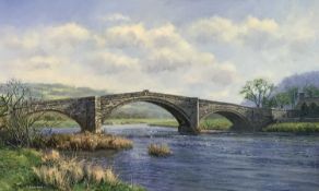 PHILIP STANTON (British b. 1955) oil on canvas - Pont Fawr, Llanrwst, 39 x 64cms Provenance: Private