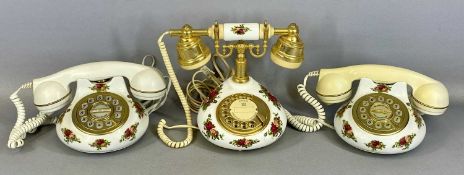 THREE ROYAL ALBERT 'OLD COUNTRY ROSES' TELEPHONES, two touch button, one rotary dial Provenance: