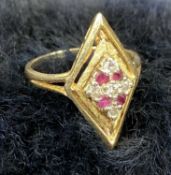 14CT GOLD LOZENGE SHAPED RING set with garnet and diamonds, marked '14k', size L, 4.1gms Provenance: