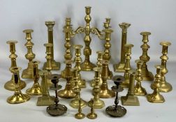 ASSORTED BRASS CANDLESTICKS/CANDLE HOLDERS, pairs and singles, 34cms (h) the tallest Provenance: