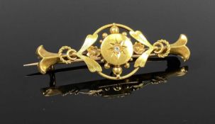 EDWARD VII 15CT GOLD BROOCH having openwork and set with small central diamond, Chester 1908, 3.2gms
