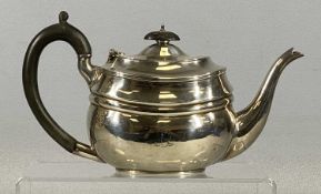 GEORGE V SILVER TEAPOT of plain oval form, ebonised handle and finial, Birmingham 1923, S
