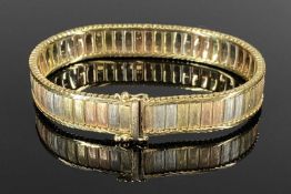 9CT TRI-COLOUR GOLD FLEXIBLE LINK BRACELET, 18cms (l), 25gms Provenance: private collection Conwy
