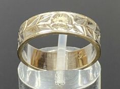 18CT WHITE GOLD WEDDING BAND having chased floral decoration, size M, 5gms Provenance: deceased
