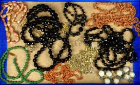 COSTUME JEWELLERY NECKLACES including coral beads, green glass beads, black glass beads, gold plated