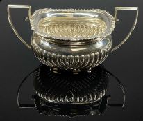 GEORGE V SILVER TWO-HANDLED SUGAR BASIN having half reeded body and gadrooned shell cast border,
