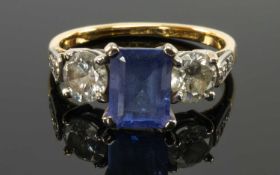 18CT YELLOW GOLD & PLATINUM TANZANITE & DIAMOND THREE STONE RING, the central claw set rectangular