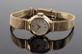 YELLOW METAL LADIES WRISTWATCH, the 14ct gold brick link tapering bracelet stamped '0,585' and '