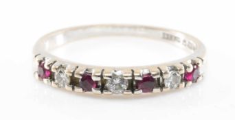 RUBY & DIAMOND 7-STONE HALF HOOP RING, set in 9ct yellow gold plain shank, sponsor's mark DS&Co.,