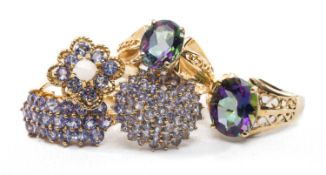 ASSORTED 9CT DRESS RINGS, comprising two mystic topaz solitaire rings, and two pave set presumed