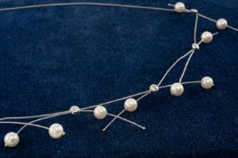 CONTEMPORARY DIAMOND & PEARL NECKLACE, sponsor's mark 'HW,' 5 small diamonds in circular rub over