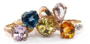 FIVE 9CT SINGLE-STONE RINGS, comprising two presumed morganite rings, fire opal ring, peridot