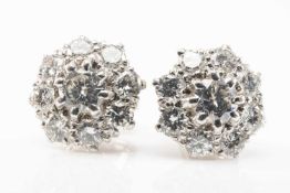 PAIR OF 18CT WHITE GOLD DIAMOND CLUSTER EARRINGS, the central stones (0.15cts approx.) within a