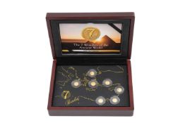THE 7 WONDERS OF THE ANCIENT WORLD GOLD COIN COLLECTION, containing 7 x 0.5g 24ct miniature gold