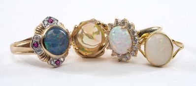 ASSORTED OPAL DRESS RINGS, in 9, 14 & 18ct settings, and including opal doublet, ruby and white