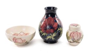 THREE PIECES OF MOORCROFT TUBELINED POTTERY comprising Anemone vase, candlestick cypher for 1992,