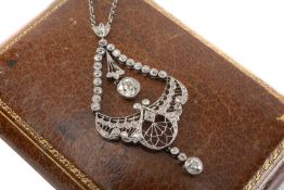 ANTIQUE DIAMOND ENCRUSTED PENDANT of openwork design, diamond suspension above winged body, triple