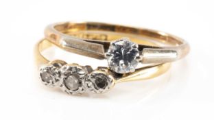 TWO 18CT GOLD & PLATINUM DIMAOND RINGS comprising three stone illusion set and solitaire (0.25cts