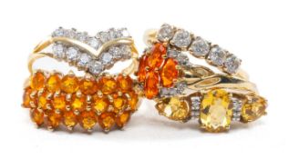 FIVE GOLD COLOURLESS & ORANGE GEMSTONE RINGS, 14ct 5-stone presumed white sapphire ring, 9ct cz