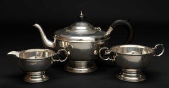 GEORGE VI SILVER THREE PIECE TEA SERVICE Birmingham 1937, comprising teapot, sucrier and cream