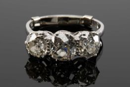 PLATINUM THREE STONE DIAMOND RING, the old cut stones measuring 3.0cts overall approx., ring size Q,