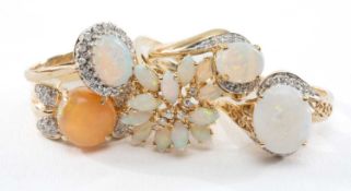 ASSORTED OPAL & DIAMOND DRESS RINGS, in 9 & 14ct settings, and including a fire opal, tot gross wt