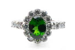 14CT WHITE GOLD PRESUMED CHROME DIOPSIDE RING, oval stone above 12 diamond surround, and triple