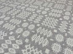 VINTAGE TRADITIONAL WELSH WOOLLEN BLANKET with cream coloured geometric design with a grey ground,