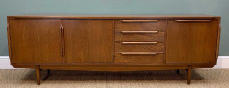 MID-CENTURY TEAK SIDEBOARD, fitted with drawers, cupboards, shelves, raised on tapering turned