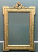 DECORATIVE VICTORIAN STYLE GILT METAL MIRROR with rococo crest and outset corners, later gilded, 106