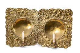 PAIR DUTCH BRASS WALL SCONCES, embossed foliate border, concave circular reflecting centre and