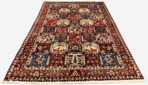 BAKHTIARI GARDEN RUG, stylised flowers, animals, tree's and leaves in compartments, palmette