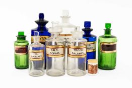 COLLECTION OF APOTHACARY JARS including, two green, TINCT:OPII, PULV:OPII, two blue, SYR: THYMI: