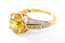 18CT GOLD SPHALERITE & DIAMOND RING, the princess cut principle stone 10 x 10mm, with 8 brilliant