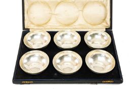 CASED SET OF SIX GEORGE V SILVER BOWLS, of plain circular form, London 1928, Richard Comyns, 16ozt