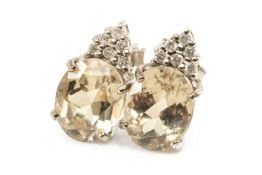PAIR 9CT GOLD ZULTANITE EARSTUDS, principle stones 9 x 7mm, each below six small brilliant cut