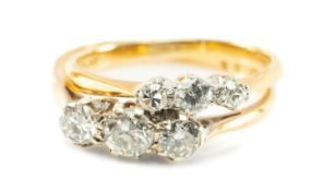 TWO 18CT GOLD & PLATINUM THREE STONE DIAMOND RINGS, 4.0gms gross, both in vintage Crouch of