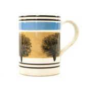 MOCHA WARE PINT MUG / TANKARD, decorated with dendritic repeating pattern on a brown ground within