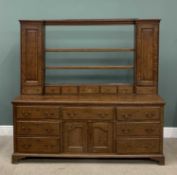 19TH CENTURY OAK WELSH DRESSER with open shelf rack, flanked by two cupboard doors, spice drawers,