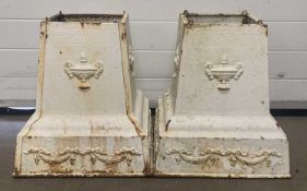 PAIR OF ORNATE CAST IRON URN STANDS, painted white with relief, 48 (h) x 44 (w) x 44cms (d)