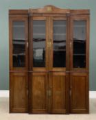 OAK BREAKFRONT BOOKCASE CUPBOARD circa 1900, having brass inlay and four glazed upper doors and