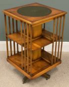 REPRODUCTION YEW REVOLVING BOOKCASE with tooled top, 85 (h) x 50 (w) x 50cms (d) Provenance: